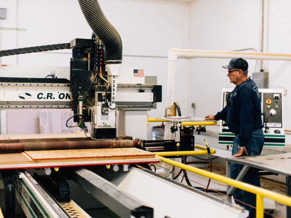 Man milling plywood